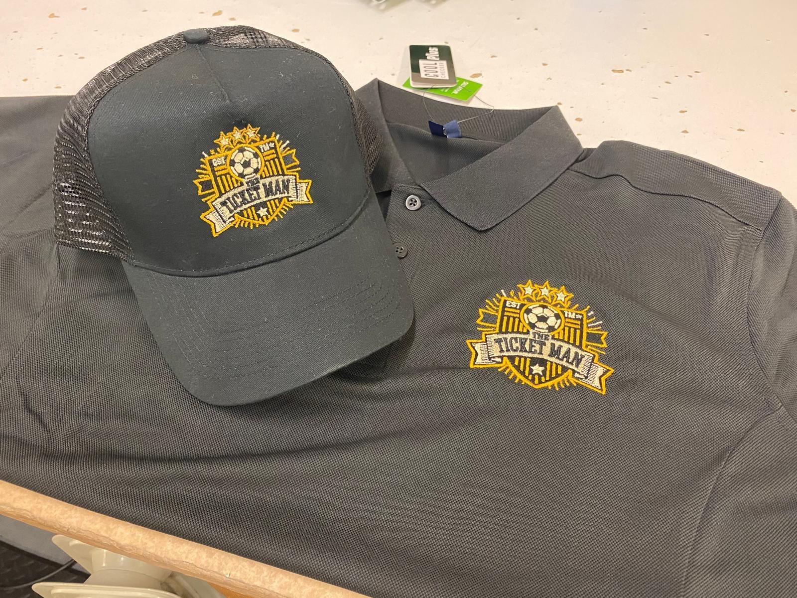 Grey cap and polo shirt with matching gold embroidery
